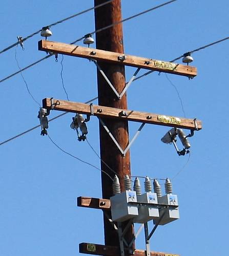 Line Construction Details > Capacitors (?) on a 4.8KV distribution line.